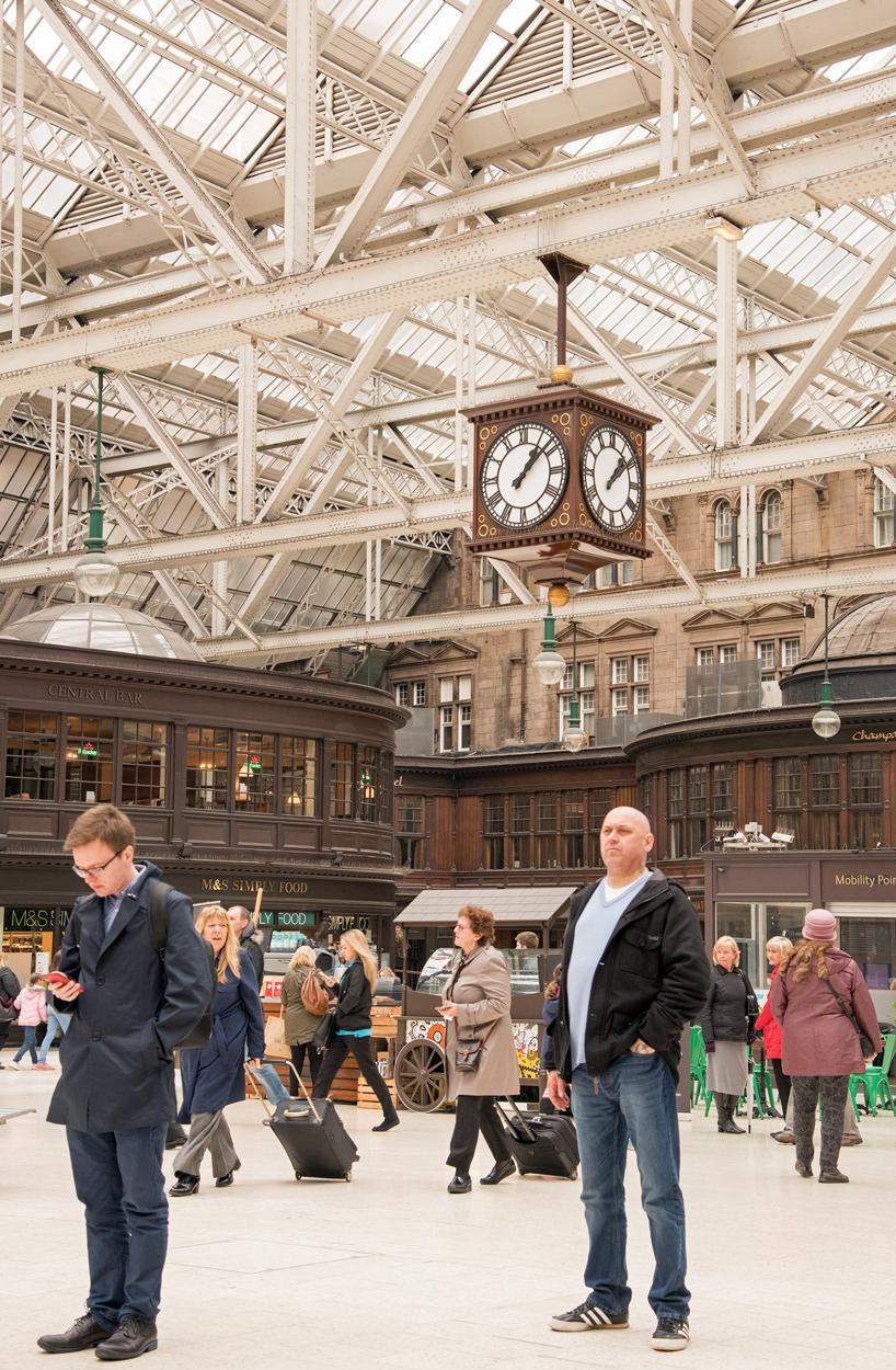 A timeless moment beneath Glasgow Central's iconic clock — The Carlisle Kid