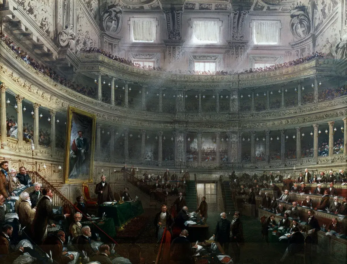 A historic Turin interior provides a visual reference for the desk-based setups in the city. Photo: Carlo Bossoli