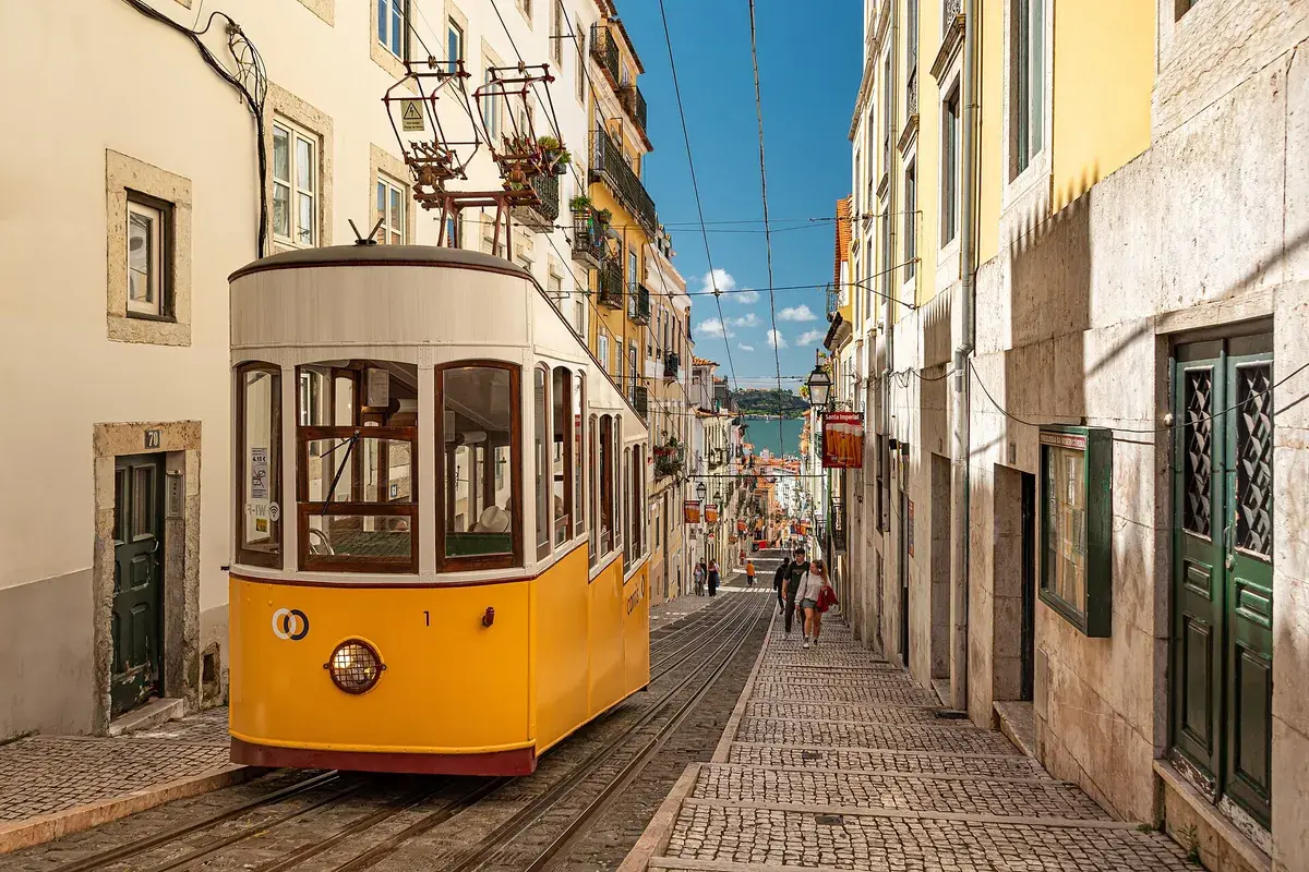 The Elevador da Bica funicular climbs a steep street toward the river. Photo: Jorge Franganillo, CC BY 2.0