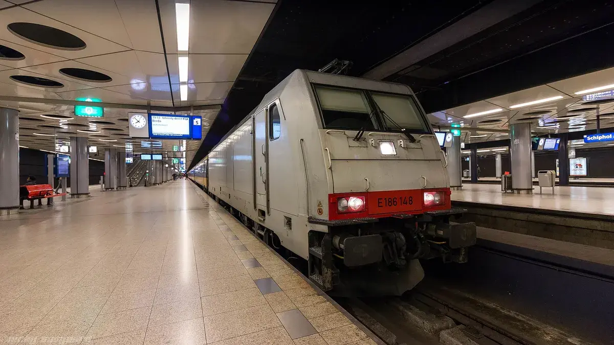 An NS intercity train waits at a platform in Schiphol Airport railway station. Photo: Nicky Boogaard, CC BY 2.0