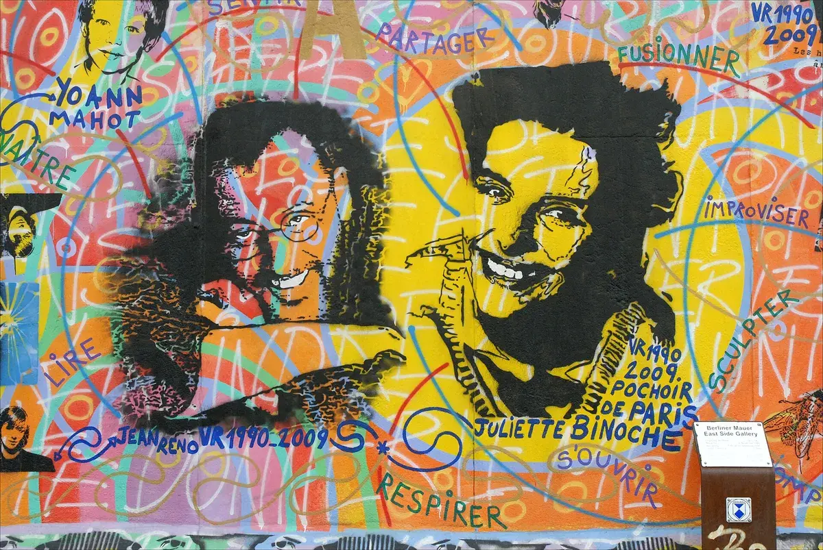 A painted stretch of the East Side Gallery, the longest surviving section of the Wall. Photo: Jean-Pierre Dalbéra, CC BY 2.0