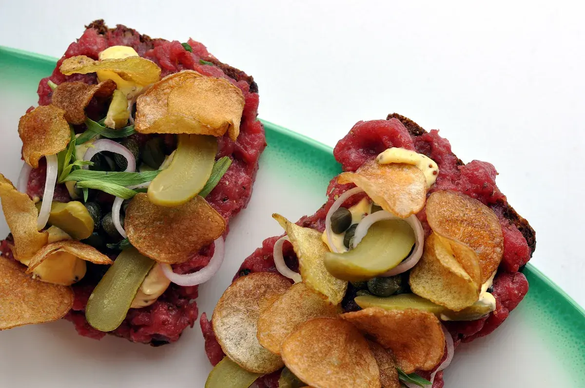 Open rye-bread sandwiches topped with steak tartare, the classic Danish lunch. Photo: cyclonebill, CC BY-SA 2.0